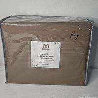 Front view of packaged Bibb Home Luxury Bamboo King Sheet Set