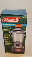 Retail box front showing Coleman Personal Lantern branding and model