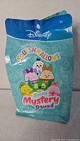 Front of sealed Disney Squishmallows Scented Mystery Squad bag