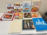 All eleven books displayed front and back rows