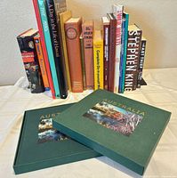 All books in lot including boxed "Australia" and upright row of assorted titles