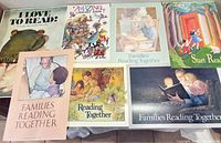 All seven posters laid out on table