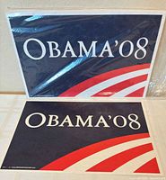 Stacked sealed pack showing front design OBAMA ’08 with red swoosh