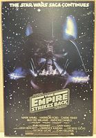 Front view of plaque showing full poster artwork and wear on edges