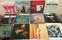 All twelve album covers laid out showing titles and artwork