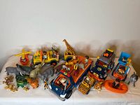 Wide shot showing all vehicles, figures and animals