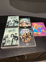 Two 90210 box sets, Melrose Place DVD, Hannah Montana DVD