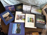 Group of nine Richard Bain photography books on London, Stratford, Niagara and Cheers displayed on table