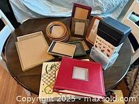 Group shot showing frames, album, recipe boxes and binder