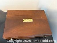 Closed wood jewellery box top view