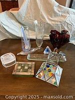 Group shot of all nine glass items on table