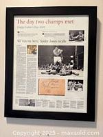 Framed newspaper article featuring Muhammad Ali, black frame, glass front