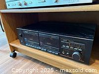 Front view of Philips PD 500B dual cassette deck on shelf