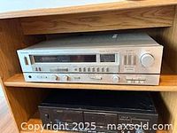 Front view of Technics SA-222 receiver in shelf