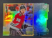 Front of Connor Bedard UD3 rookie card showing foil design and player image