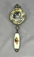 Full view of Royal Doulton Old Country Roses over-cup tea strainer
