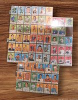 Full view of all 68 vintage hockey cards arranged in plastic sheets