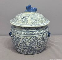 Front view of blue and white ginger jar with lid