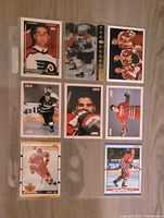 Eight Eric Lindros hockey cards displayed in sheet