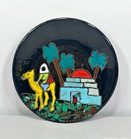 Front view of round hand painted plate