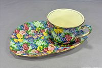 Cup on saucer angled side view