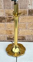 Full view of brass lamp showing tulip column, lily pad base