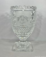 Front view showing etched Thunderbird and scalloped rim