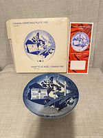 Front of plate, box and leaflet visible