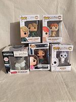 Front view of all five boxed figures