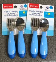 Two sealed Playtex toddler utensil packs