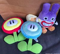 All three plush toys grouped