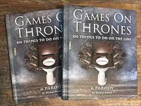 Front covers of two identical Games On Thrones books
