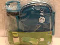 Front view of sealed lunch box and water bottle set