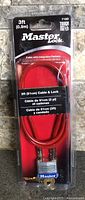 Front view of sealed Master Lock 3 ft cable and padlock in retail packaging