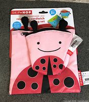 Front of packaged Skip Hop Zoo Ladybug sandwich & snack bag set