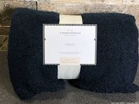 Front of throw in original wrap with Threshold designed with Studio McGee label visible