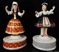 Front view of both ceramic music boxes