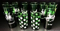 Group shot of all ten tumblers, eight Gay Nineties with white graphics, two Polka Dot with white dots
