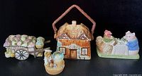 Group shot of all four ceramic collectibles