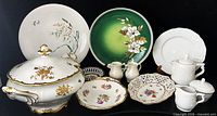 Group shot of all 11 porcelain pieces