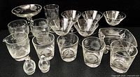 Group image showing all 17 Cornflower etched pieces for size and completeness