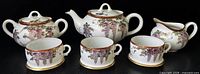 Full set: teapot, sugar bowl with lid, creamer, three cups