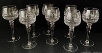 Eight crystal hock wine glasses front view