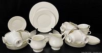 Group view of all Wedgwood Silver Ermine pieces stacked and clustered