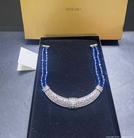 Necklace in presentation box with insert visible