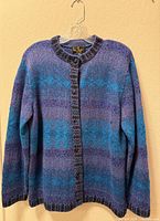 Front view of Leo Peressi blue-purple alpaca cardigan