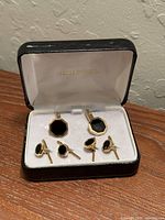 Set inside open Nordstrom box showing cufflinks and studs