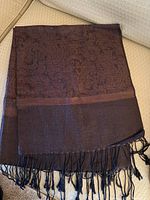 Full view of brown paisley pashmina scarf with fringe