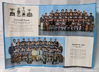 Full view of calendar page showing both team photographs and captions