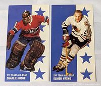 Front view of both oversize cards: Charlie Hodge and Elmer Vasko